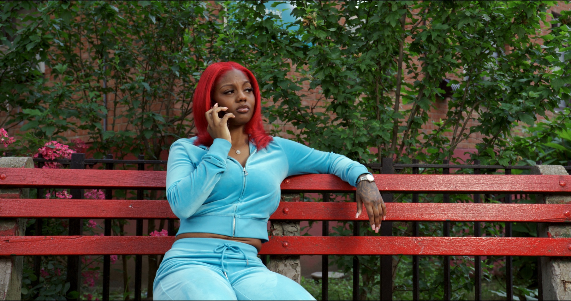 Featured cast on red bench